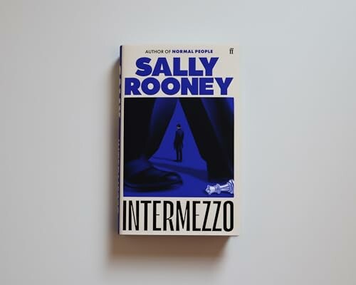 Book cover of 'Intermezzo' by Sally Rooney with a chess piece illustration.